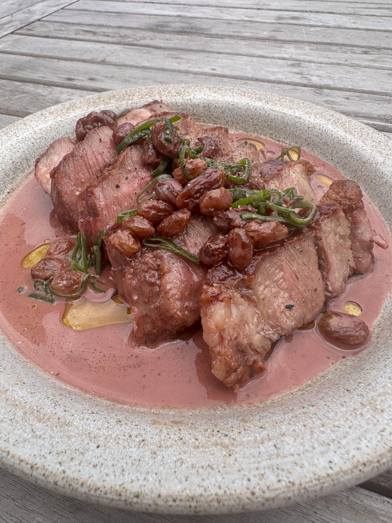 Grilled Iberico Pork Collar Steaks, Pedro Ximeinez Sherry, Sultanas & Thyme by Matt Burgess