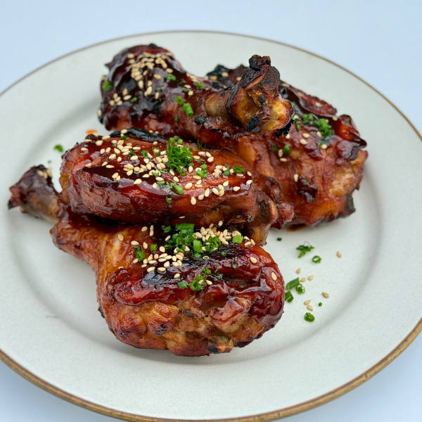 Sticky Korean Chicken Drumsticks & Thighs with Maple Syrup & Gochujang Glaze by Matt Burgess