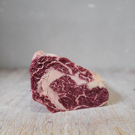 Simmental Reserve Ribeye Steak with luscious yellow fat and outstanding marbling.