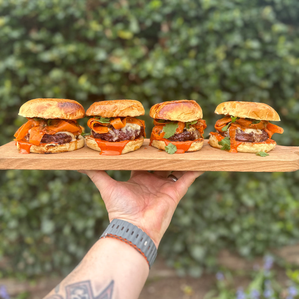 Grass fed beef burger, carrot kimchi, Gochujang mayonnaise & gruyere cheese by Matt Burgess