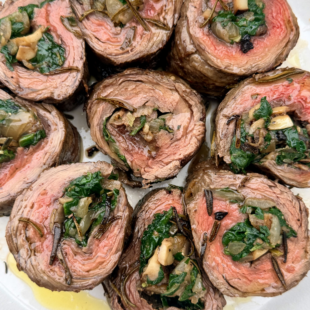 Rolled Beef Flank with Wild Mushrooms, Caramelised Onion & Spinach by Matt Burgess