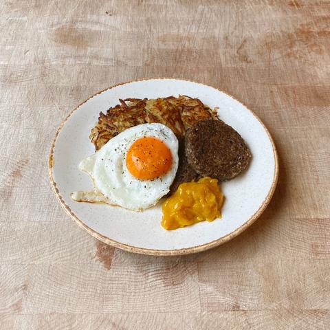 Haggis with Neeps & Tatties Rostï, Fried Egg & Piccalilli by Barry Horne