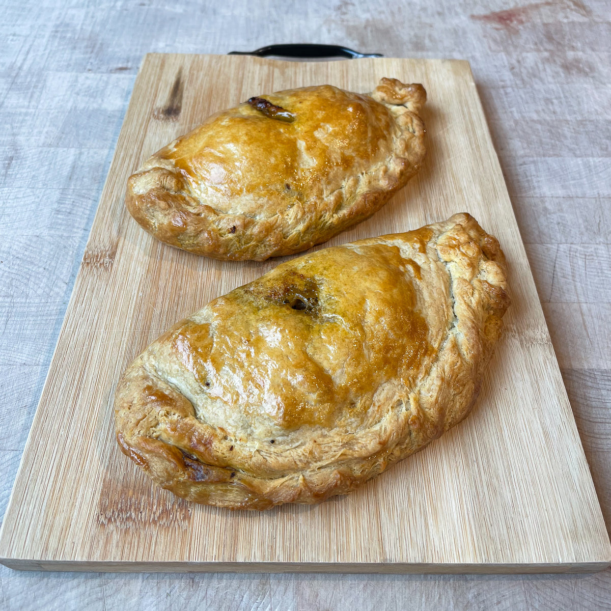 Leftover lamb shoulder pasty with peas and mint sauce by Barry Horne– Provenance Village Butcher Del