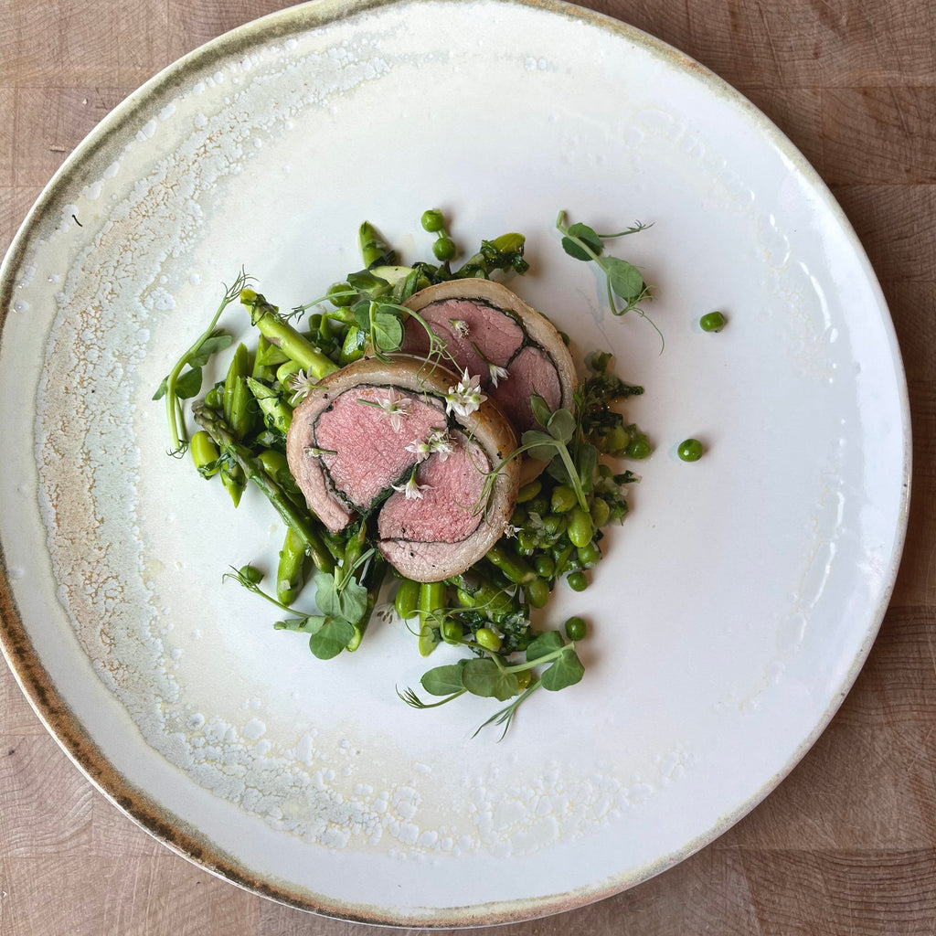 Wild Garlic stuffed Lamb Saddle with a Spring Ragout of Peas, Broad Beans and Asparagus  by Barry Horne