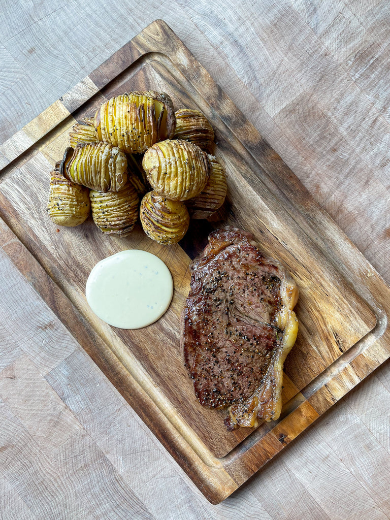 Sirloin steak, Hasselback potatoes & truffle mustard mayo.