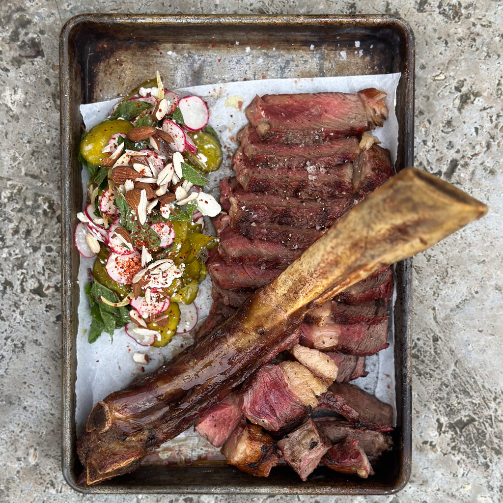 BBQ Tomahawk Ribeye with Feta, Almond & Pickle Salad by Matt Burgess