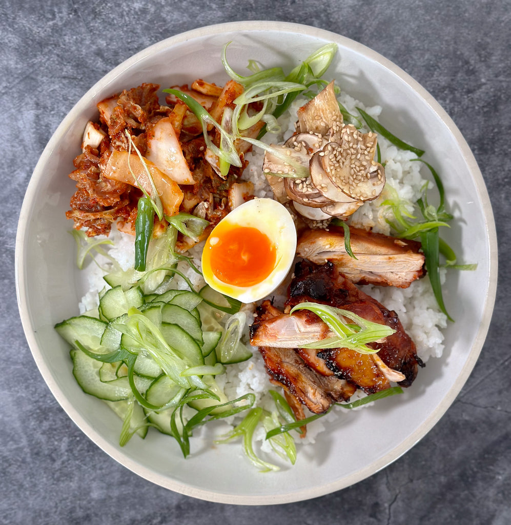 Korean BBQ chicken, soy mushroom, kimchi, and rice by Matt Burgess