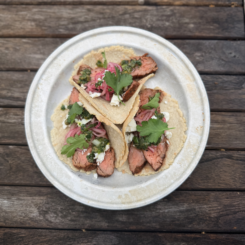 Ancho bavette tacos with charred spring onion salsa verde by Matt Verde