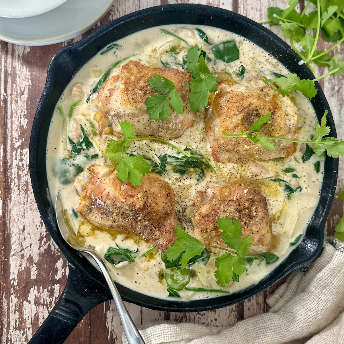 Roasted chicken thighs, white beans, thyme & spinach by Matt Burgess