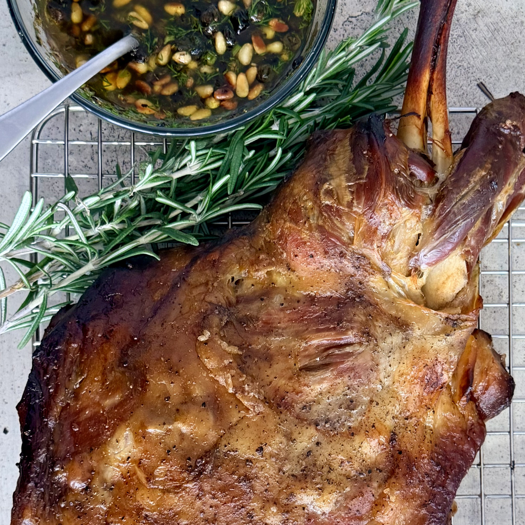 Slow Roast Lamb Shoulder with Capers, Black Garlic, Rosemary & Pine nuts by Matt Burgess