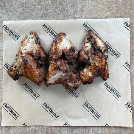 Cooked jerk chicken wings | Provenance Village Butcher